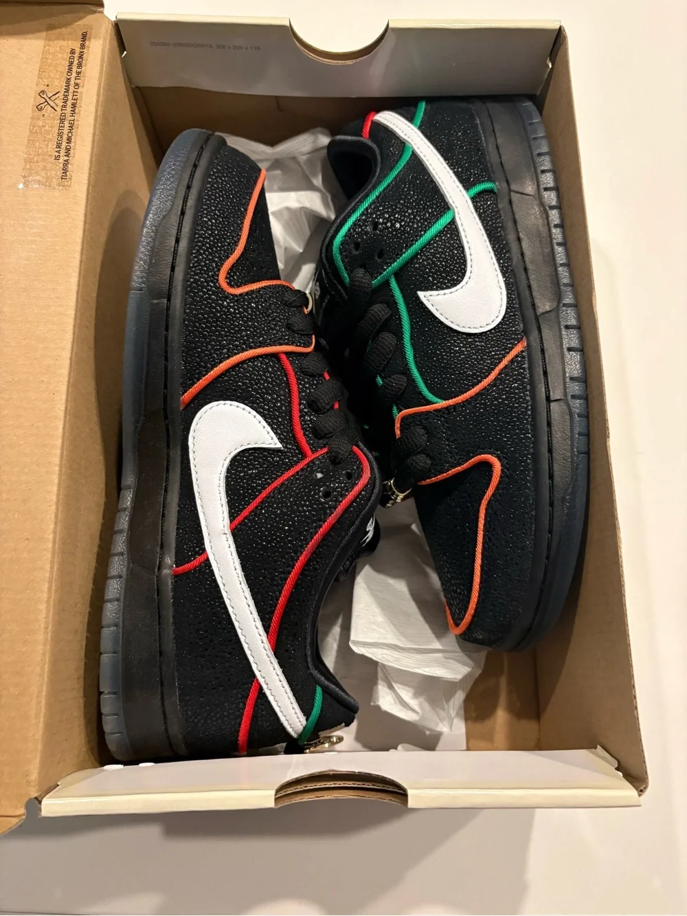 Nike Men’s Black Sneakers with White Swoosh and Orange/Red Trim